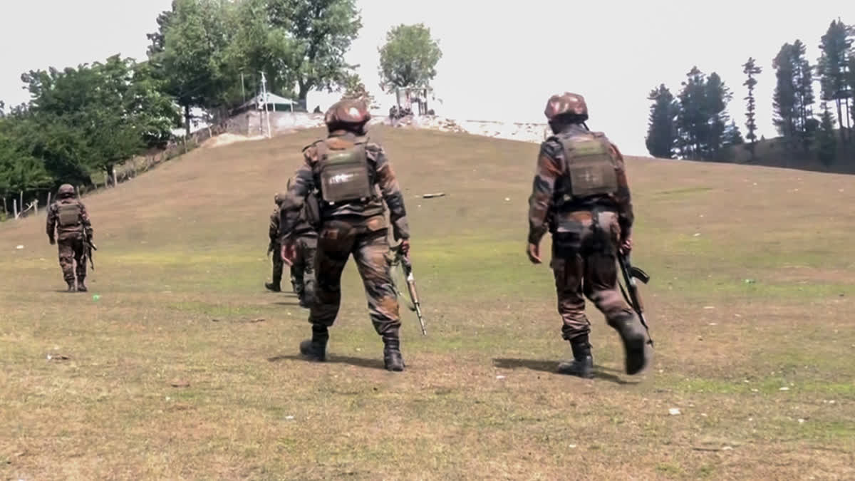 Security forces conduct a search operation following the recent encounter that broke out between terrorists and security forces, in Doda on Wednesday.