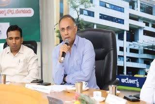 Health Minister Dinesh Gundu Rao with officials