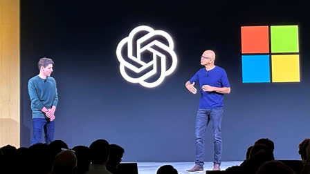 OpenAI CEO Sam Altman, left, appears onstage with Microsoft CEO Satya Nadella at OpenAI's first developer conference, on Nov. 6, 2023, in San Francisco.