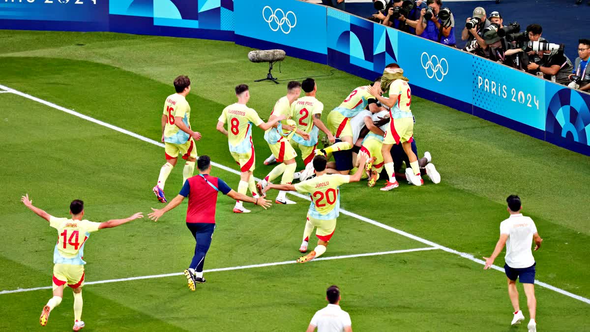 SPAIN CLINCH GOLD IN FOOTBALL