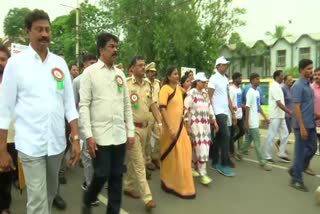 Minister Valagapudi Anita In Cyber crime Awareness Walkathon in Vijayawada