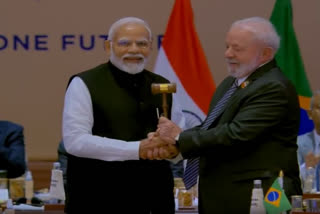 PM Modi hands over the gavel of G 20 presidency to the Brazilian President