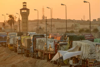 An Israeli airstrike on a Gaza Strip area, housing displaced Palestinians, has resulted in at least 40 deaths and 60 injuries. The strike targeted what Israel claims was a Hamas command centre, but Hamas denies it. This attack has caused significant destruction, with footage showing deep craters and debris.