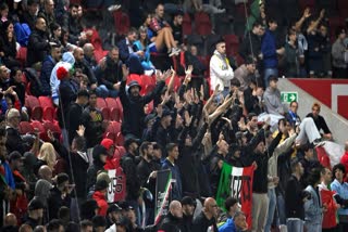 Italy's fans cheer their team during the UEFA Nations League soccer match between Israel and Italy