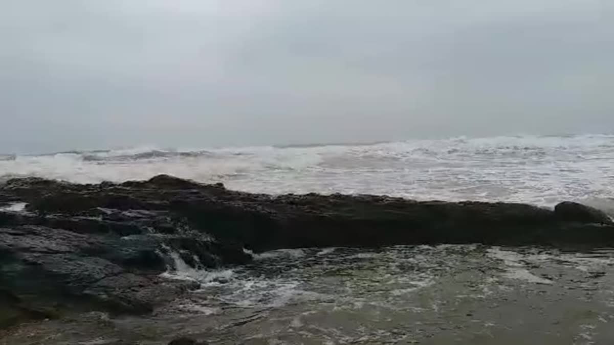 Young_Woman_Stuck_Between_Rocks_at_Visakha_Appikonda_Beach