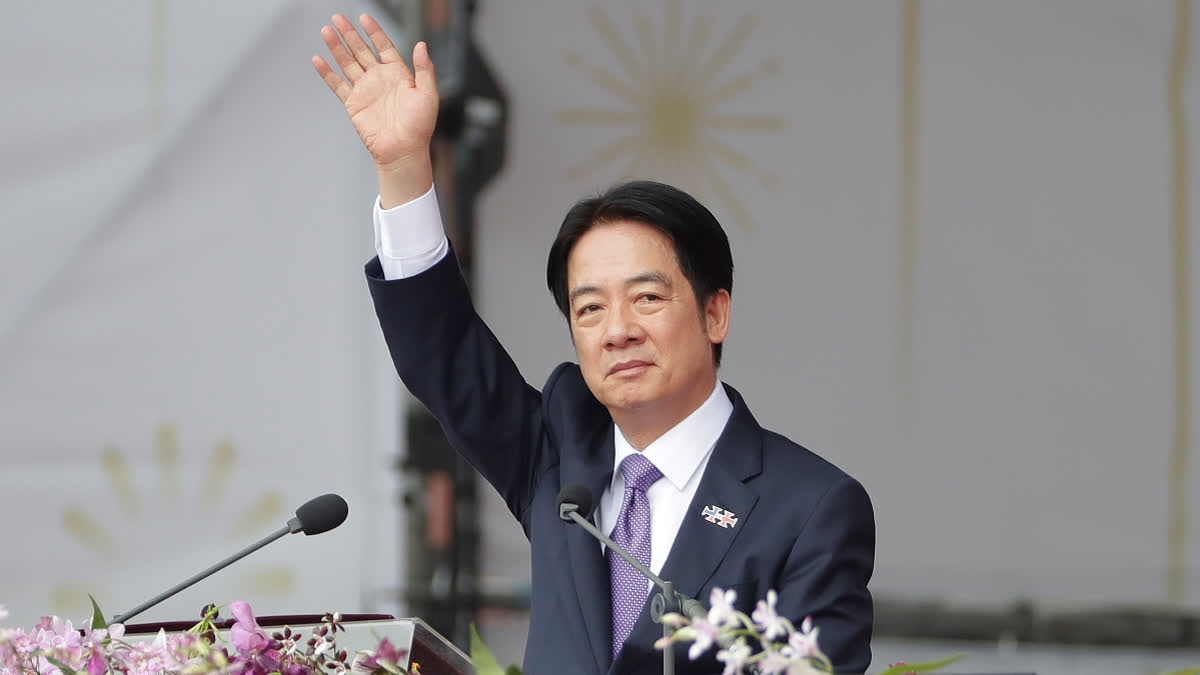 Taiwanese President Lai Ching-te waves during National Day celebrations in front of the Presidential Building in Taipei, Taiwan, Thursday, Oct. 10, 2024.