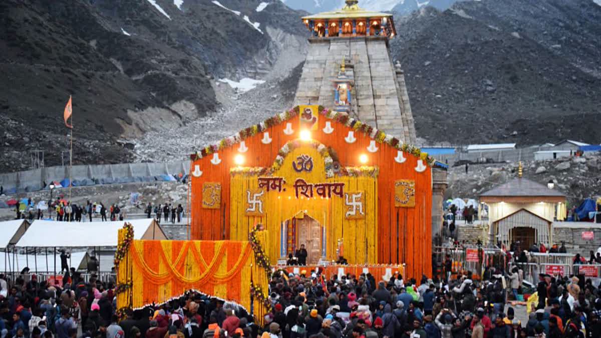 Devotees gather before the opening of the doors of the Kedarnath Dham