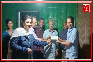 Cheque handed over to Bijay Krishna Goswami