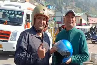 Helmet Man of India Raghvendra Kumar (Left)