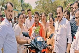 wife-gifted-scooter-to-her-husband-by-gruhalakshmi-amount