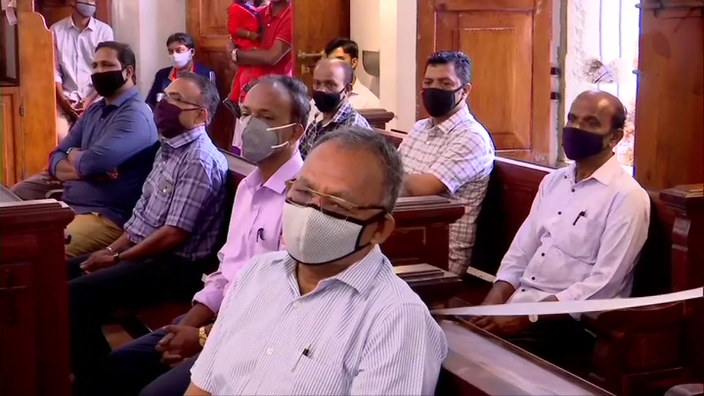 Devotees gather for Christmas prayers at a churches in India