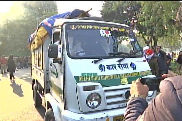 'Kar Sewa' tempo, carrying food for farmers delegation, seen at Vigyan Bhawan