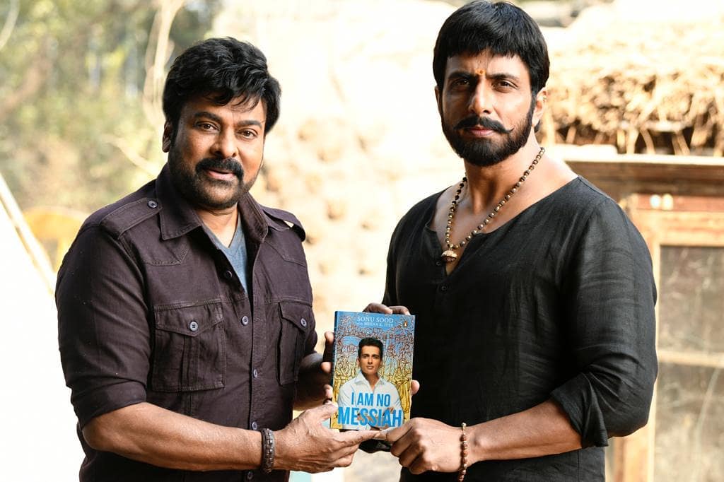 dinchak song released from red movie.. sonu sood gifts his book to megastar