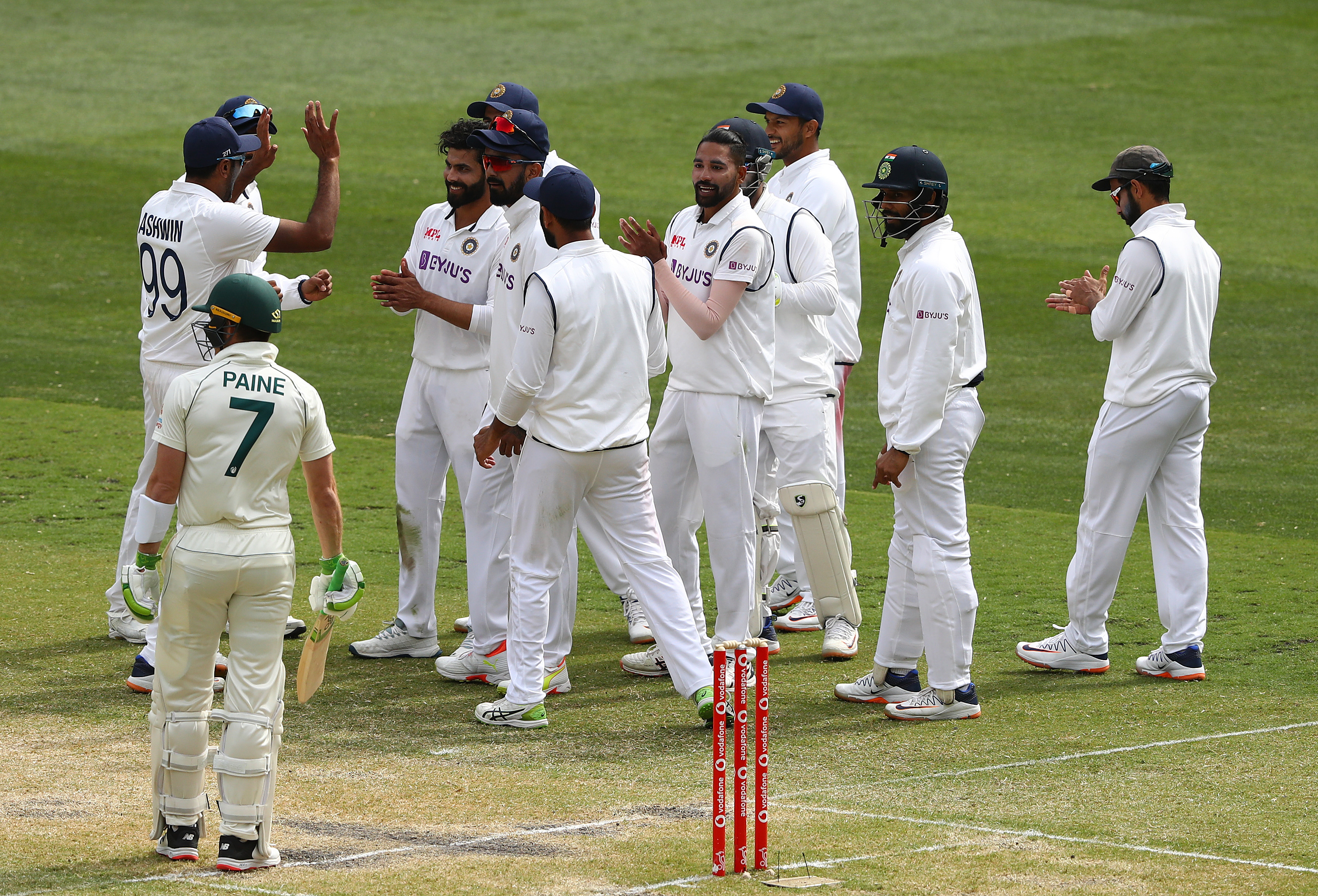 Indian players celebrate after dismissing Australia skipper Tim Paine in the second Test at MCG.