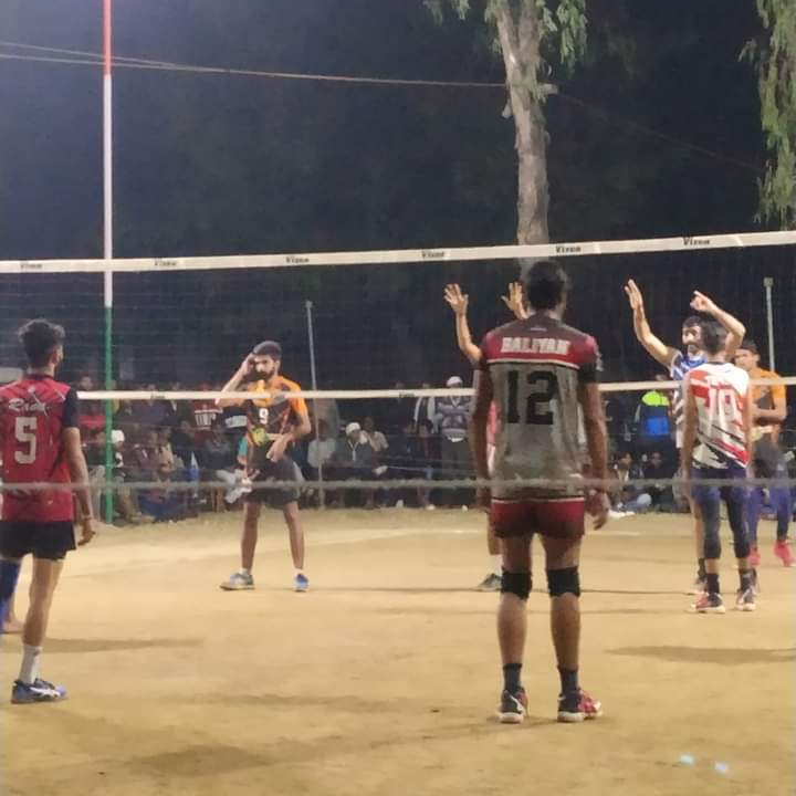 Players playing volleyball