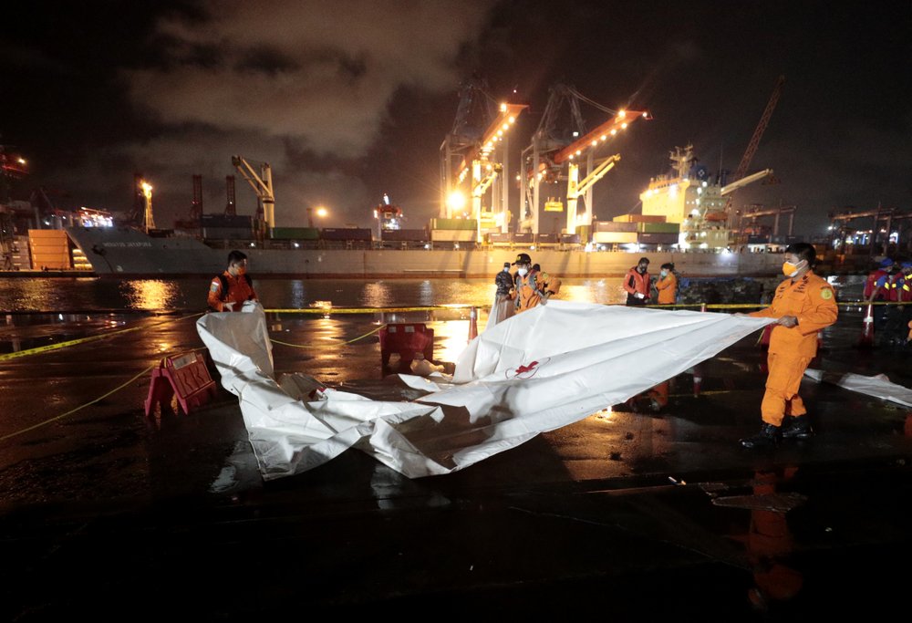 Body parts, debris found after Indonesia plane crash