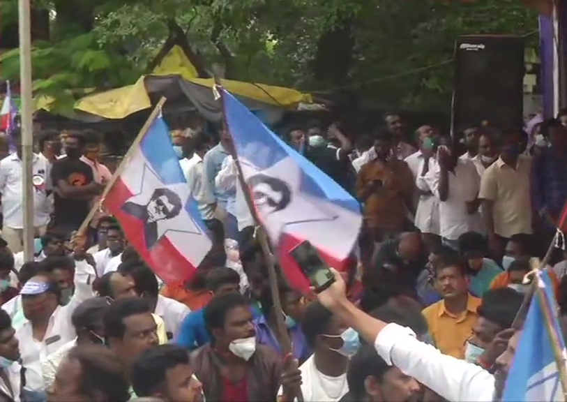 Members of Rajinikanth's fan club stage demonstration at Valluvar Kottam in Chennai