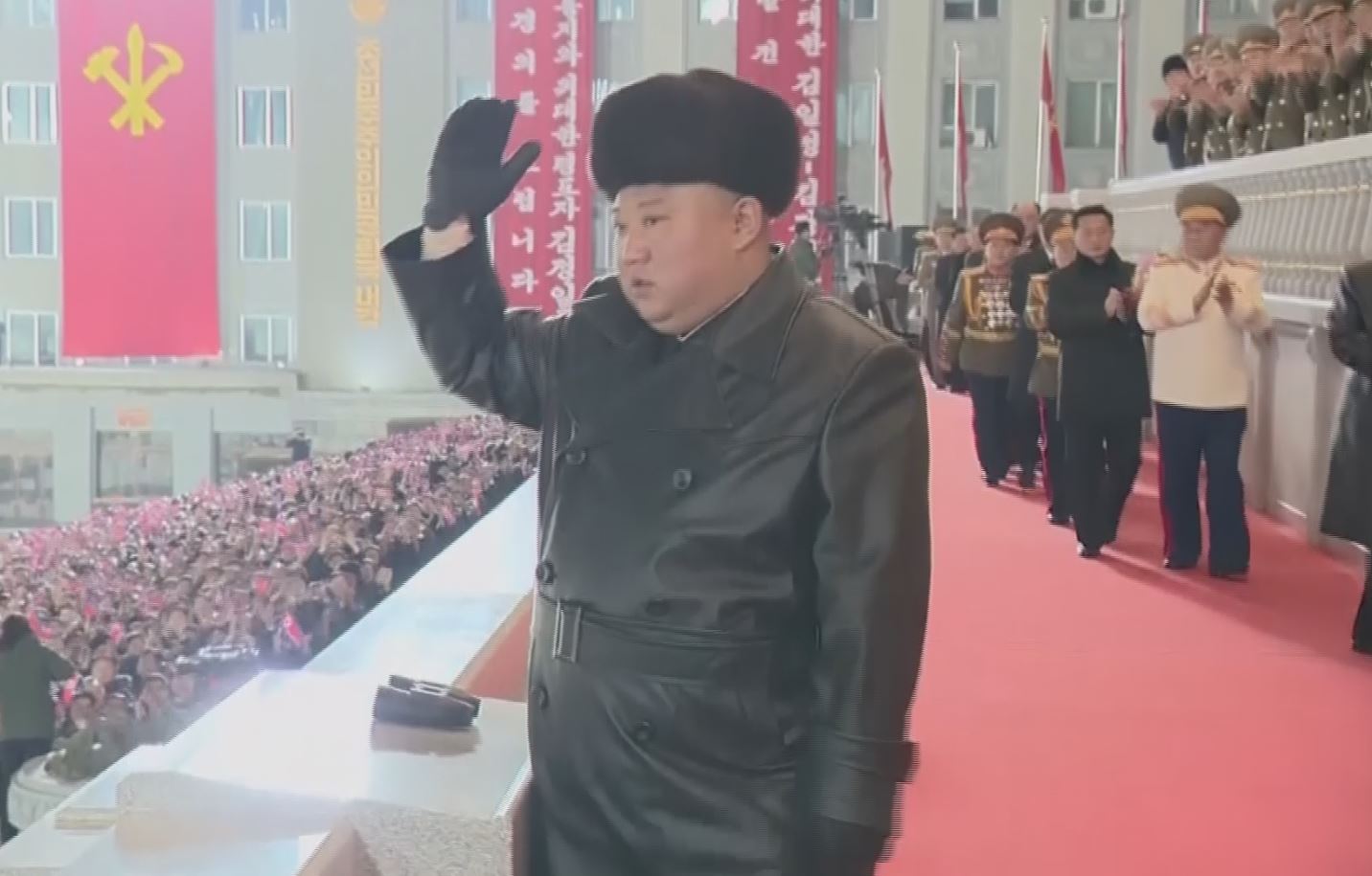 north korea holds huge military parade,vows nuclear might