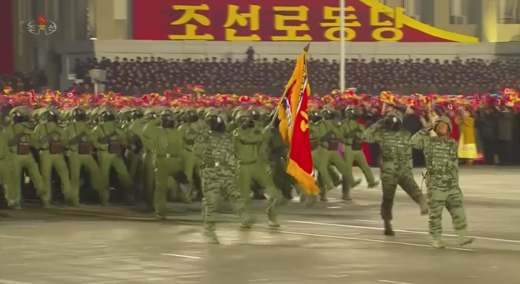 north korea holds huge military parade,vows nuclear might