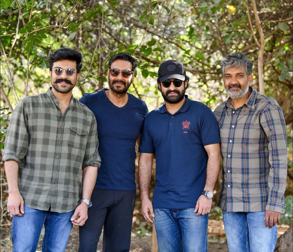 Actors Ram Charan, Ajay Devgn and Jr NTR with director SS Rajamouli