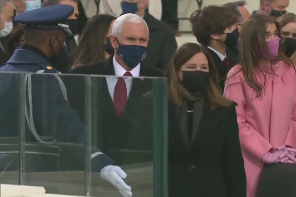 Outgoing Vice President Mike Pence arrives at the US Capitol with his wife Karen Pence to attend the inauguration ceremony.