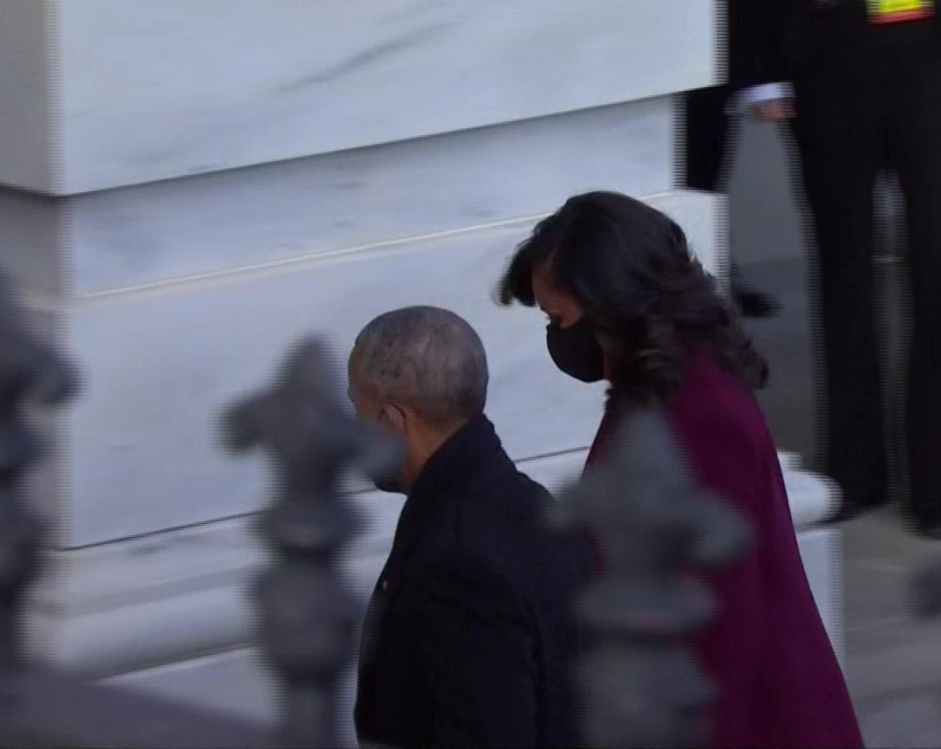 Barack Obama and former First Lady Michelle Obama arrive at the US Capitol