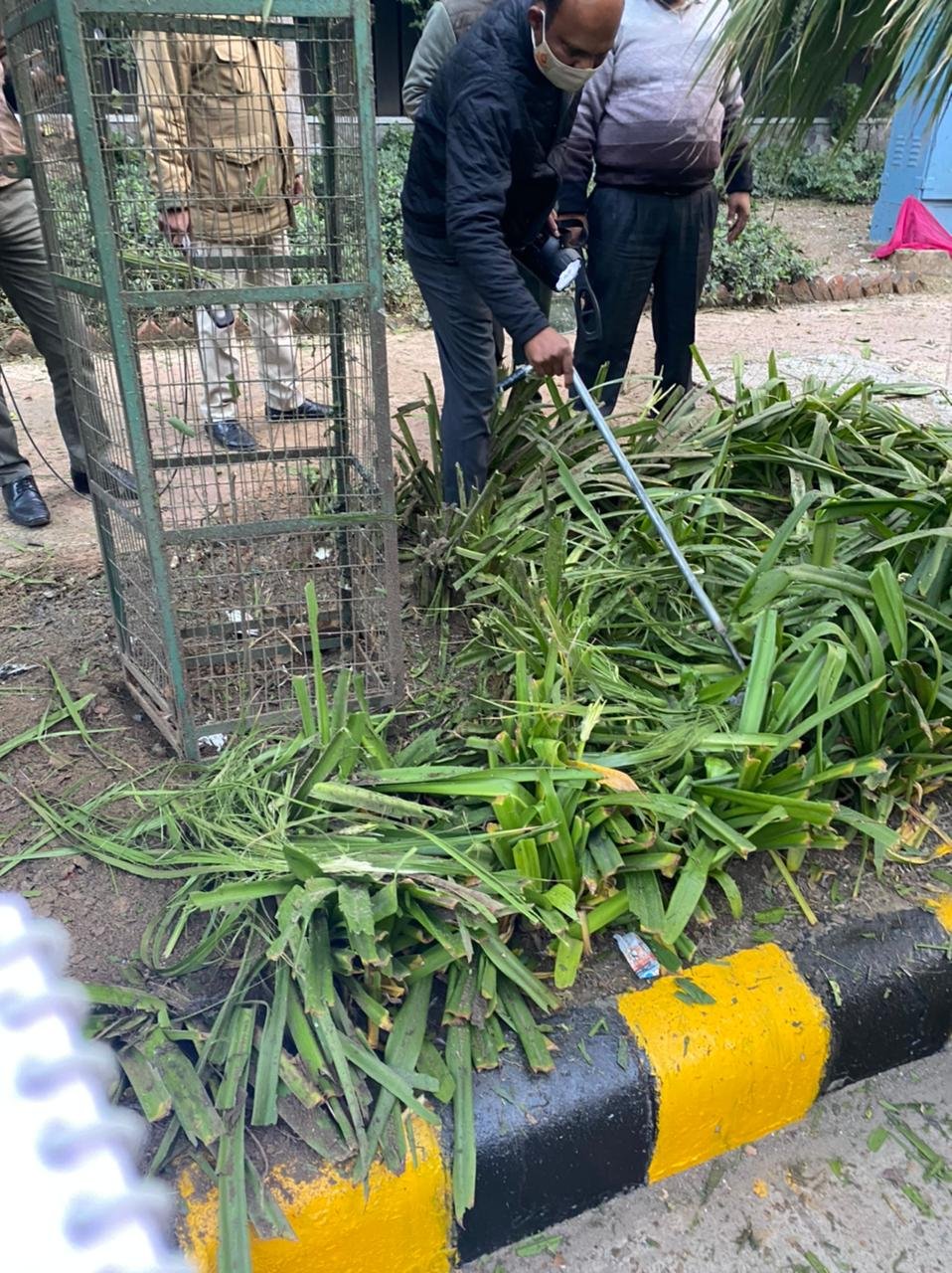 A crime investigation team of Delhi Police visits the spot where a low-intensity explosion occurred near Israel Embassy