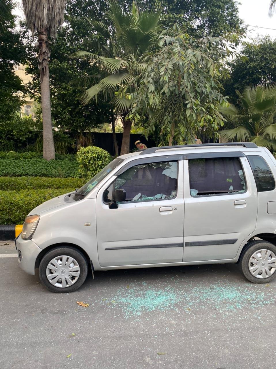 A crime investigation team of Delhi Police visits the spot where a low-intensity explosion occurred near Israel Embassy