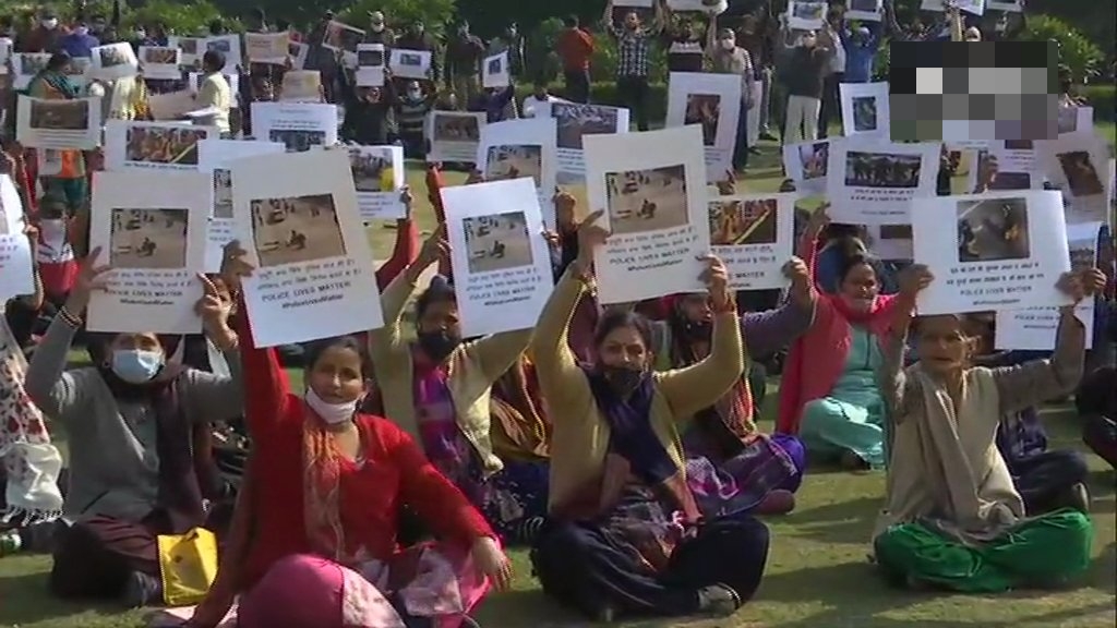 families of Police personnel who were injured in the tractor rally violence during stage a demonstration