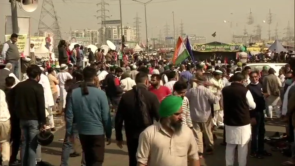 Farmers dance to folk tunes at night as cops put up barbed wires, barricades at Ghazipur border