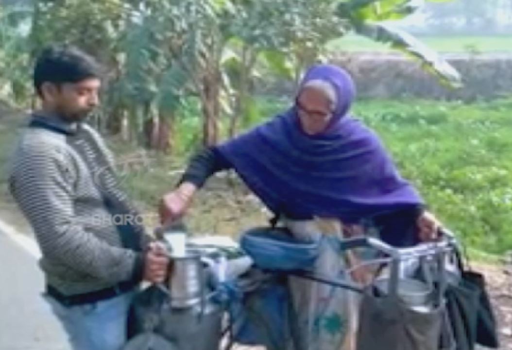 62 YEAR OLD UP WOMAN PEDDLES TO SELL MILK