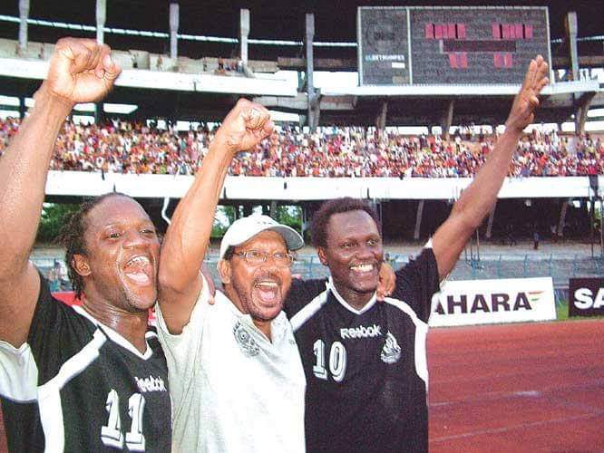 Mohammedan SC coach Shabbir Ali celebrates with his players as the Black Panthers beat East Bengal in a Kolkata League match in 2008.