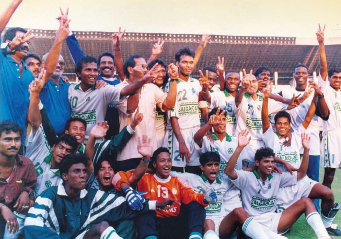 Coached by Shabbir Ali Salgaocar players celebrate after winning the 1998-99 National League title.