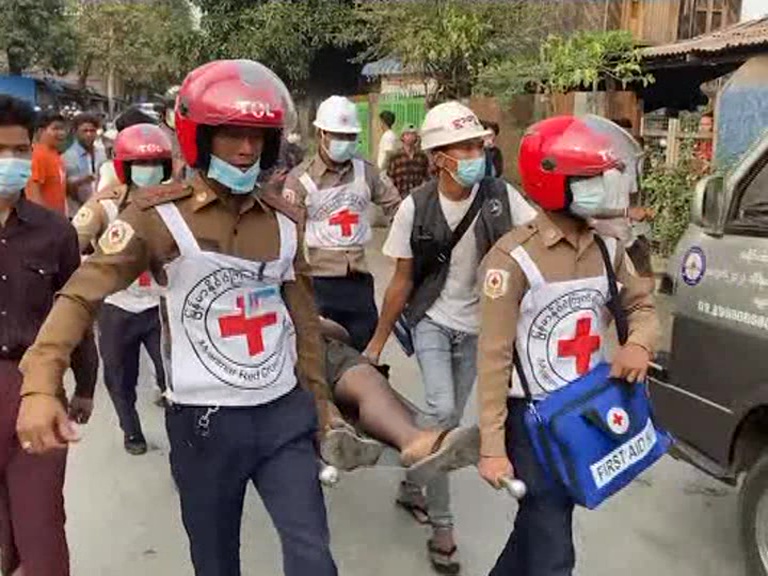 2 Myanmar protesters killed by police fire, reports say