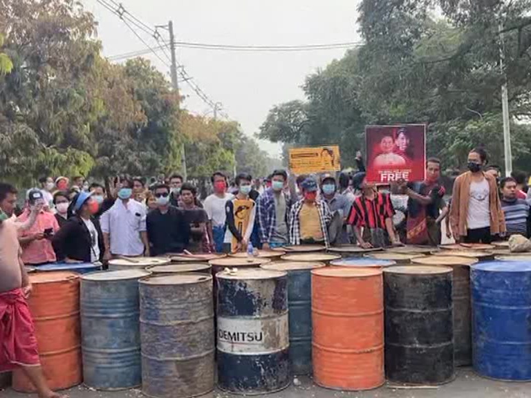 2 Myanmar protesters killed by police fire, reports say