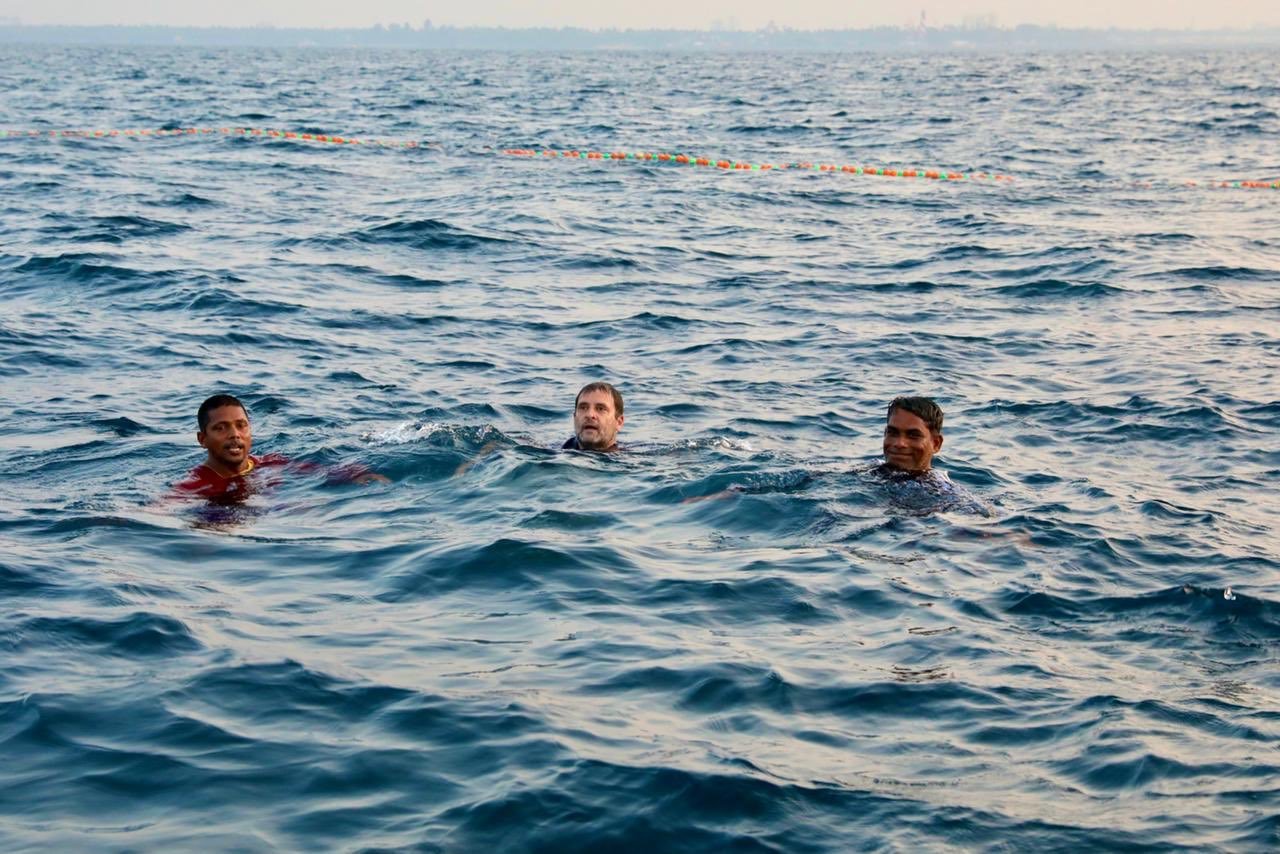 Rahul Gandhi swimming in the sea with fishermen