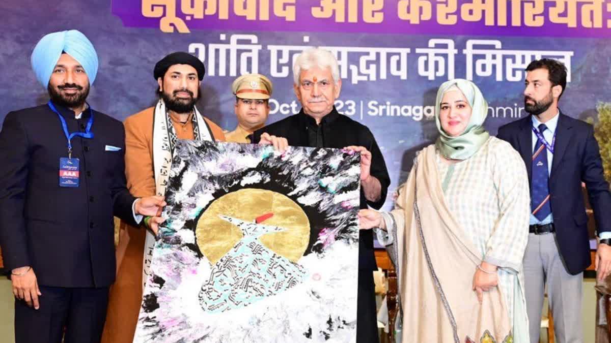 Kashmir Calligrapher Saiqa Rasheed (Second from right) receiving an award from LG Manoj Sinha