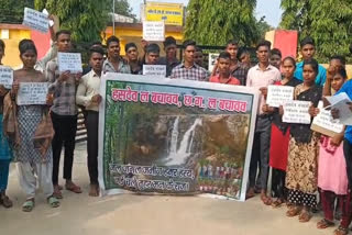 Protest against tree cutting in Hasdev Aranya