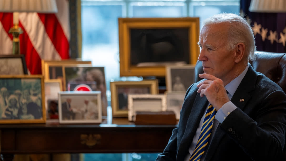 President Joe Biden listens during a briefing regarding the federal response to the spread of wildfires in the Los Angeles area, Friday, Jan. 10, 2025, in the Oval Office at the White House in Washington.