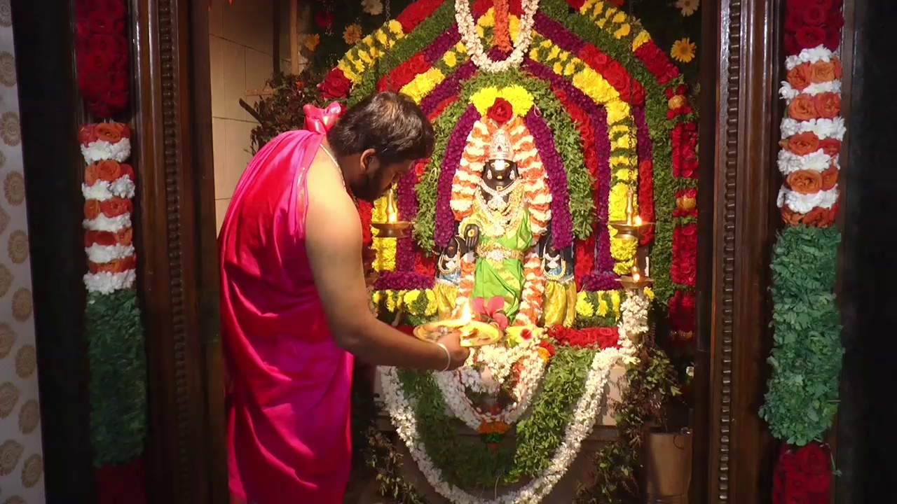 Priest offering prayers to Lord Venkateswara