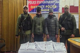 File photo of drug peddlers arrested by Police in Srinagar.