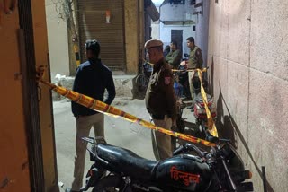 Cops at the spot where a father son duo were stabbed to death in Malviya Nagar area of Delhi