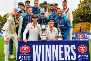 Australia's pose with their trophies after defeating New Zealand by three wickets in the second cricket test in Christchurch, New Zealand, Monday, March 11, 2024.