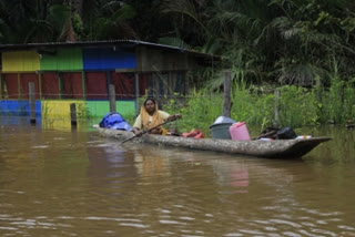 At least 26 dead and 11 missing after flash floods and landslides on Indonesia's Sumatra island