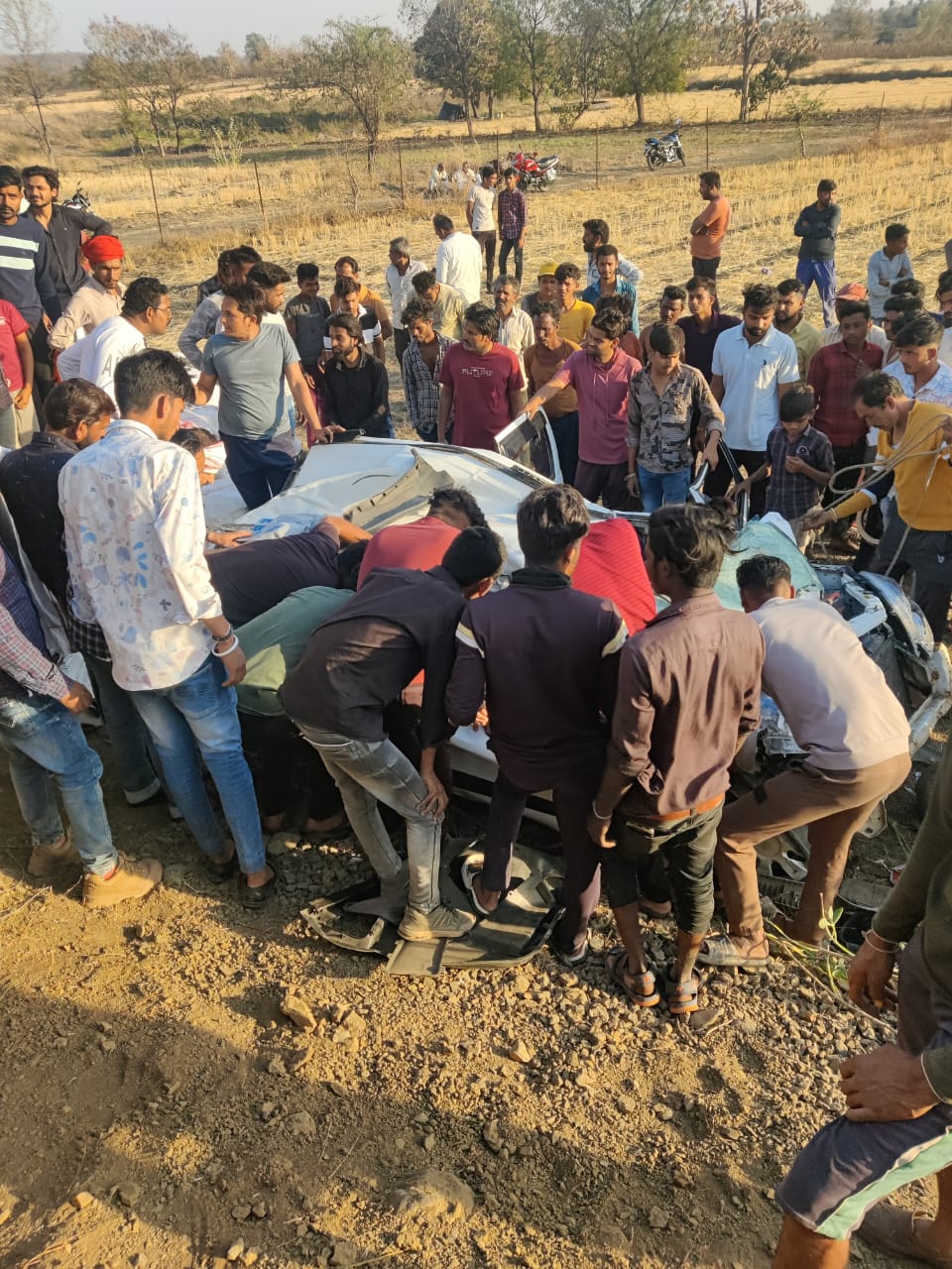 Loaded truck fell over car in Indore