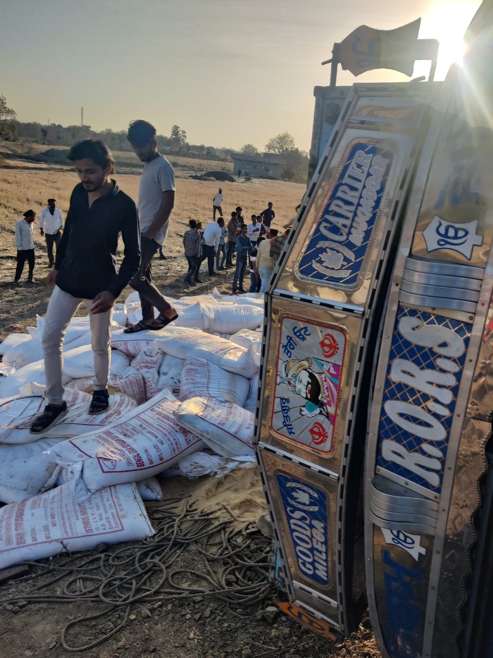 Loaded truck fell over car in Indore