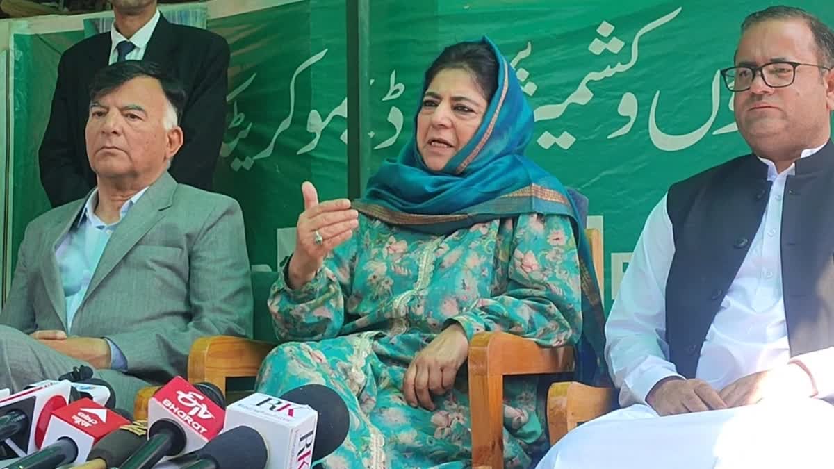 PDP President Mehbooba Mufti (C) addressing a presser along with party workers