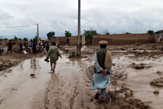 Flash floods from unusually heavy seasonal rains in Afghanistan have killed more than 300 people and destroyed over 1,000 houses, the U.N. food agency said Saturday.