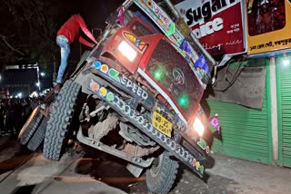 Sand loaded Truck overturns