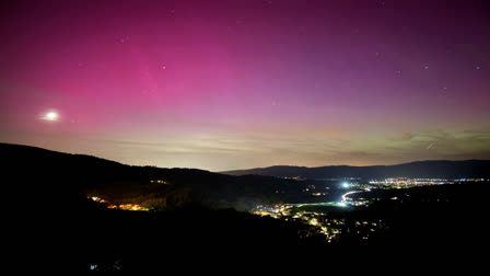 Northern lights appear over the Dreisamtal valley in the Black Forest near Germany's Freiburg on Friday evening.